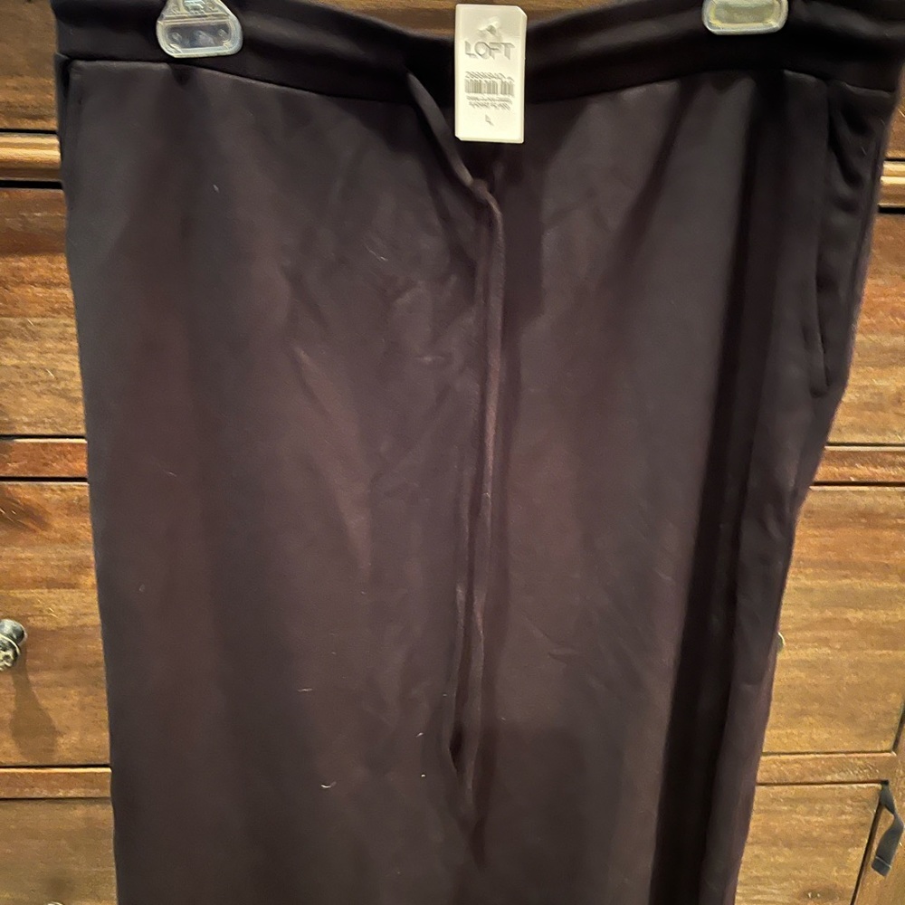 Black Loft cotton skirt with pockets.